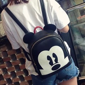 Disney Mickey backpack with Minnie pink bracelet